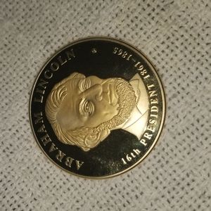 Abraham Lincoln gold dollar giant coin